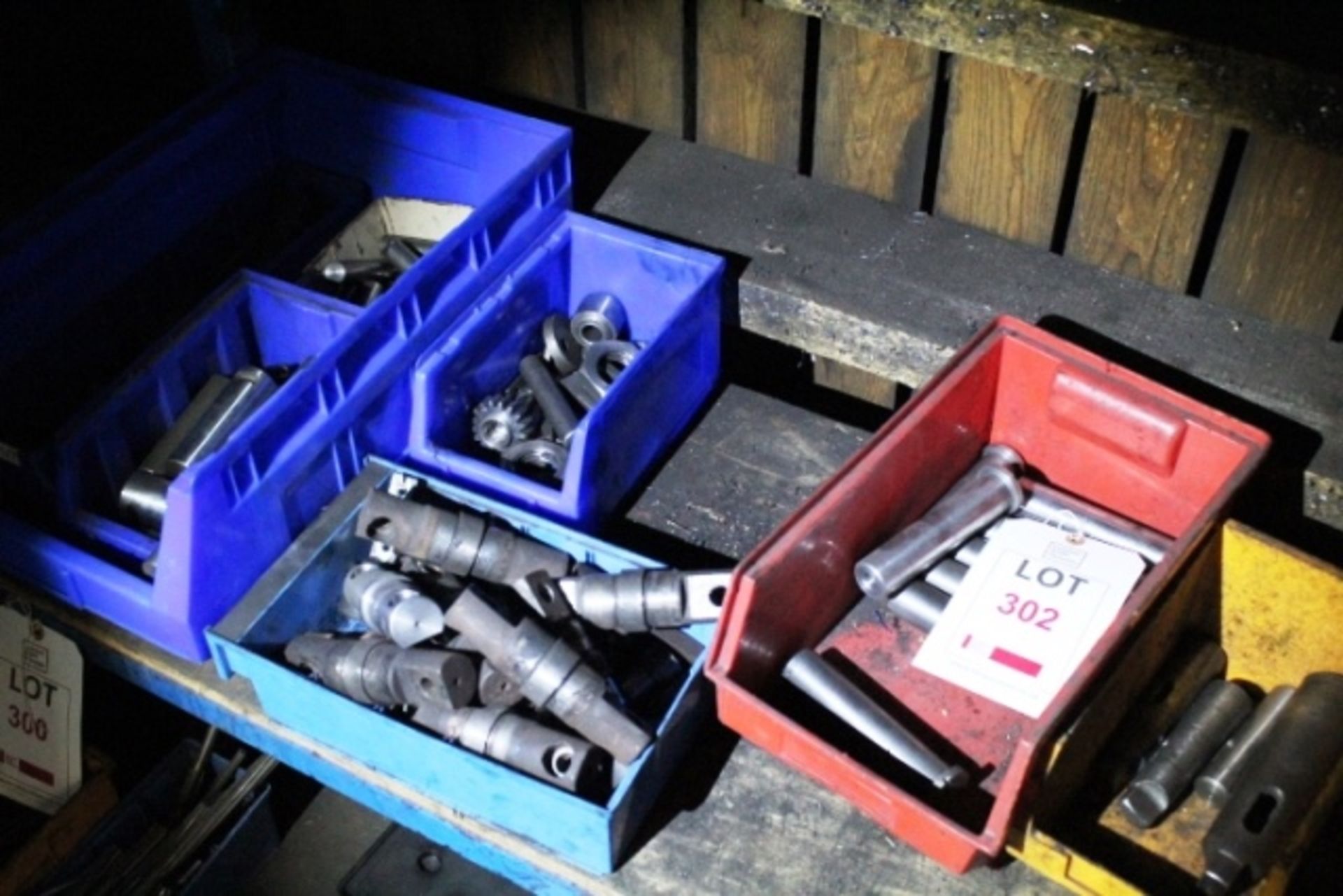 Quantity of assorted drilling sleeves, bolts & attachments etc.