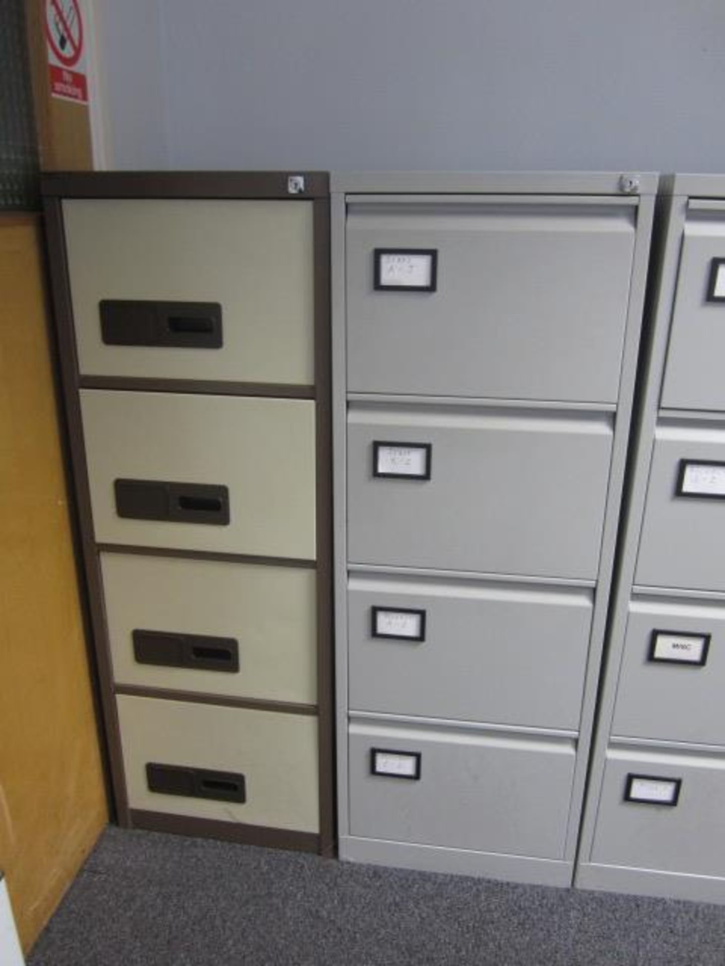 Two metal, 4 drawer filing cabinets