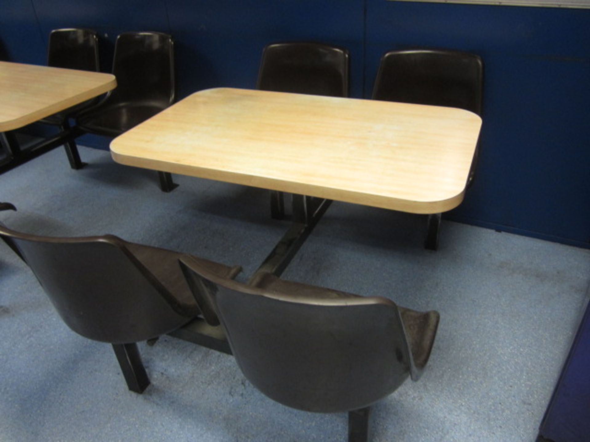 Two wood effect canteen tables with four fixed seats - Image 2 of 2