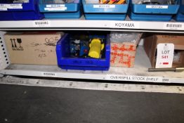 Shelf of assorted stock contents to include Tibo springs, valves, steel holding pins, brushes,