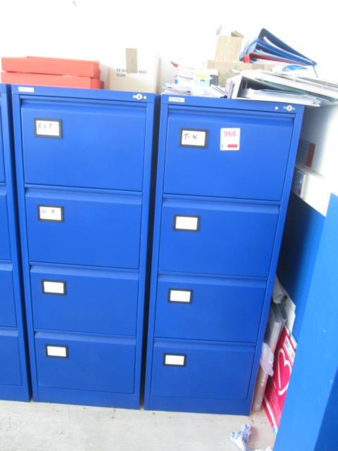 Two metal 4 drawer filing cabinets