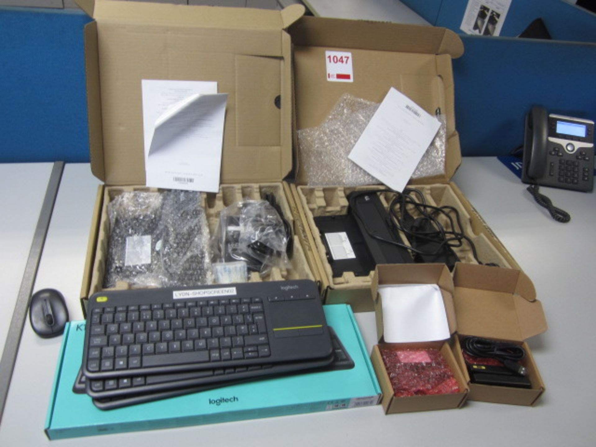 Two Dell docking stations, four assorted keyboards, two Wasp Magstripe readers