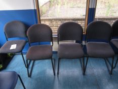 Four assorted upholstered meeting chairs