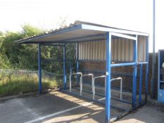 Metal box frame bike shelter, with cladded roof, half cladded rear, open side, four bike sections,