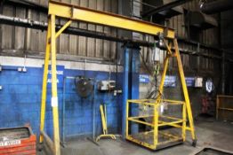 Steel framed mobile gantry with Stahl Crane Systems chain block hoist and pendant control system,
