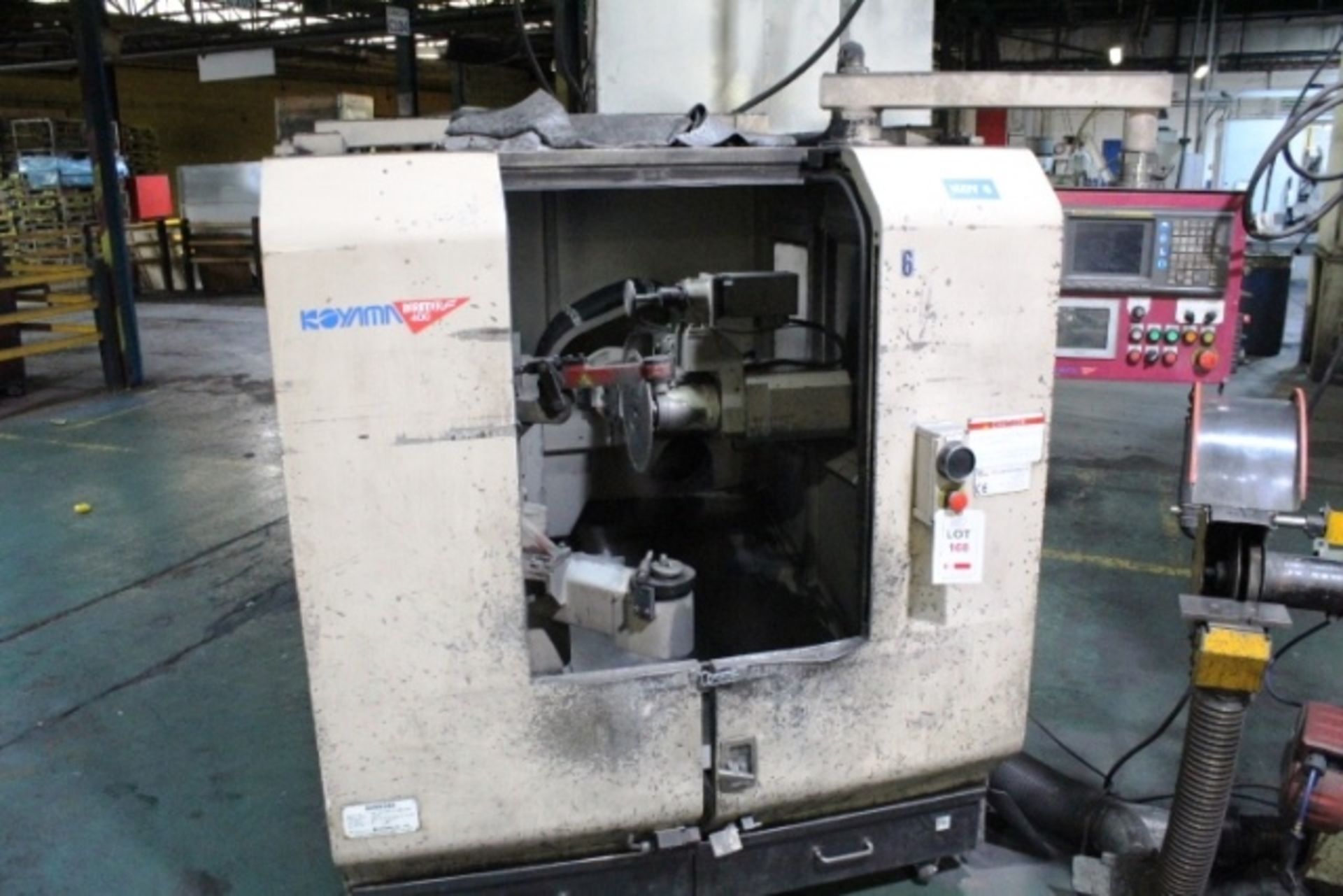 Koyama Barinder 400 automatic twin head grinding machine with rotary arm, model X6-FDS22R-443GRS,