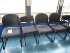 Four assorted upholstered meeting chairs
