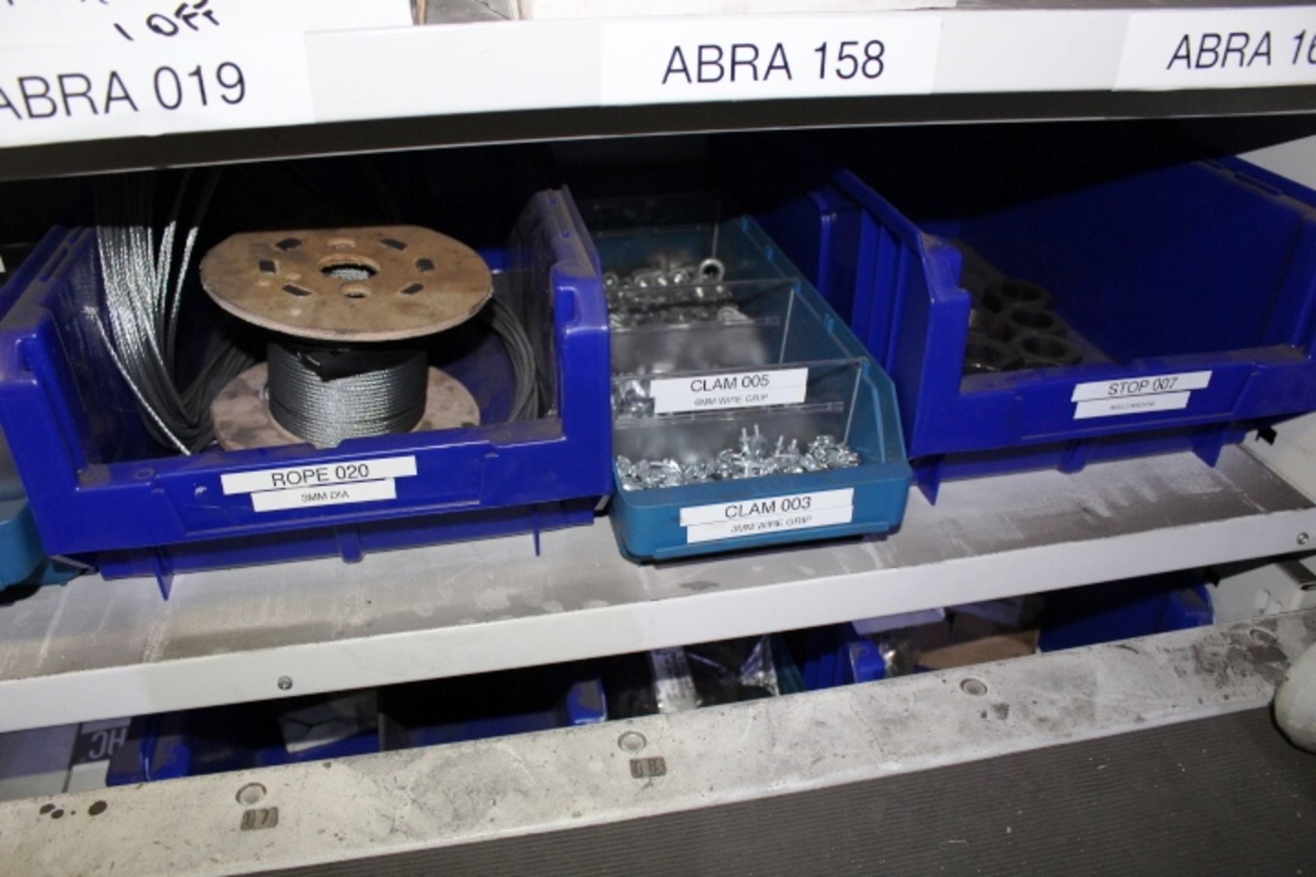 Shelf of assorted stock contents to include assorted valves, switches, 3mm dia wire rope, wire - Image 5 of 5