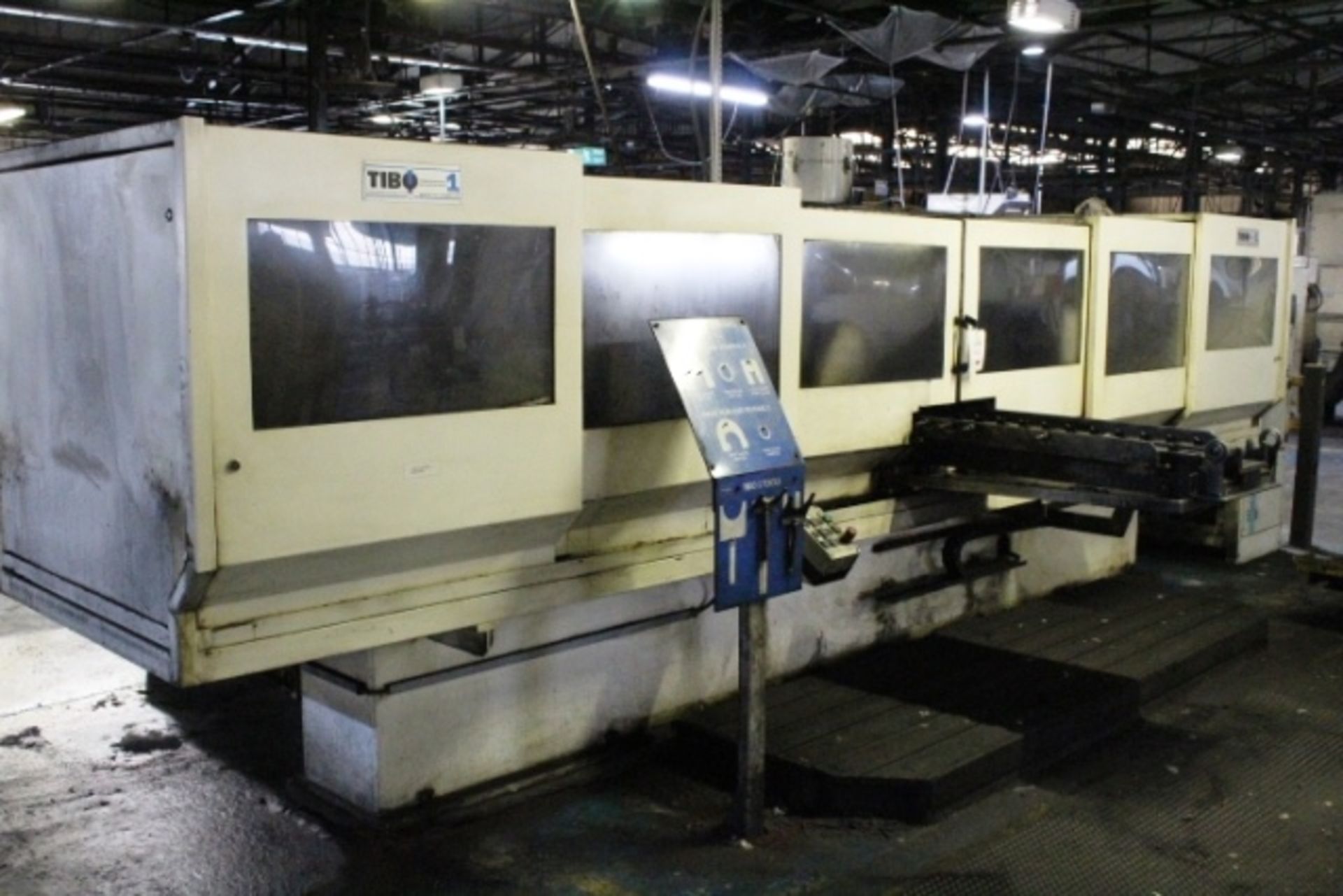 Tibo E15-6-1000TU, 6 spindle deep hole gun drill with 31 station fixed component feed table, Siemens