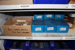Shelf of assorted stock contents to include flat washers, socket head cap screws, ring clips,
