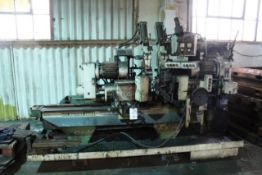 Hey Machine Tools No. 03 twin vice automatic facing and centering machine, sliding head, serial