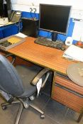Dark wood desk, Dell desktop PC, flat screen monitor, keyboard, mouse, etc.