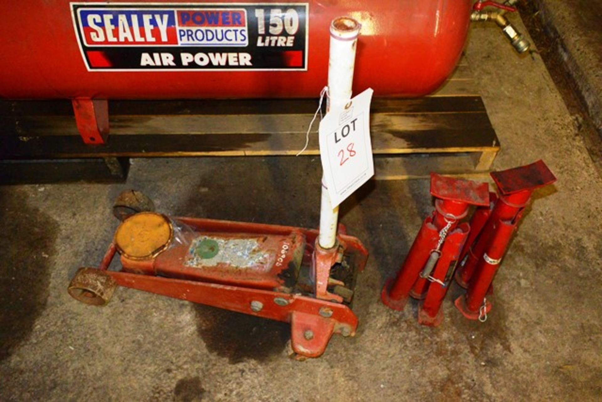 Unbadged trolley jack and two Sealey axle stands