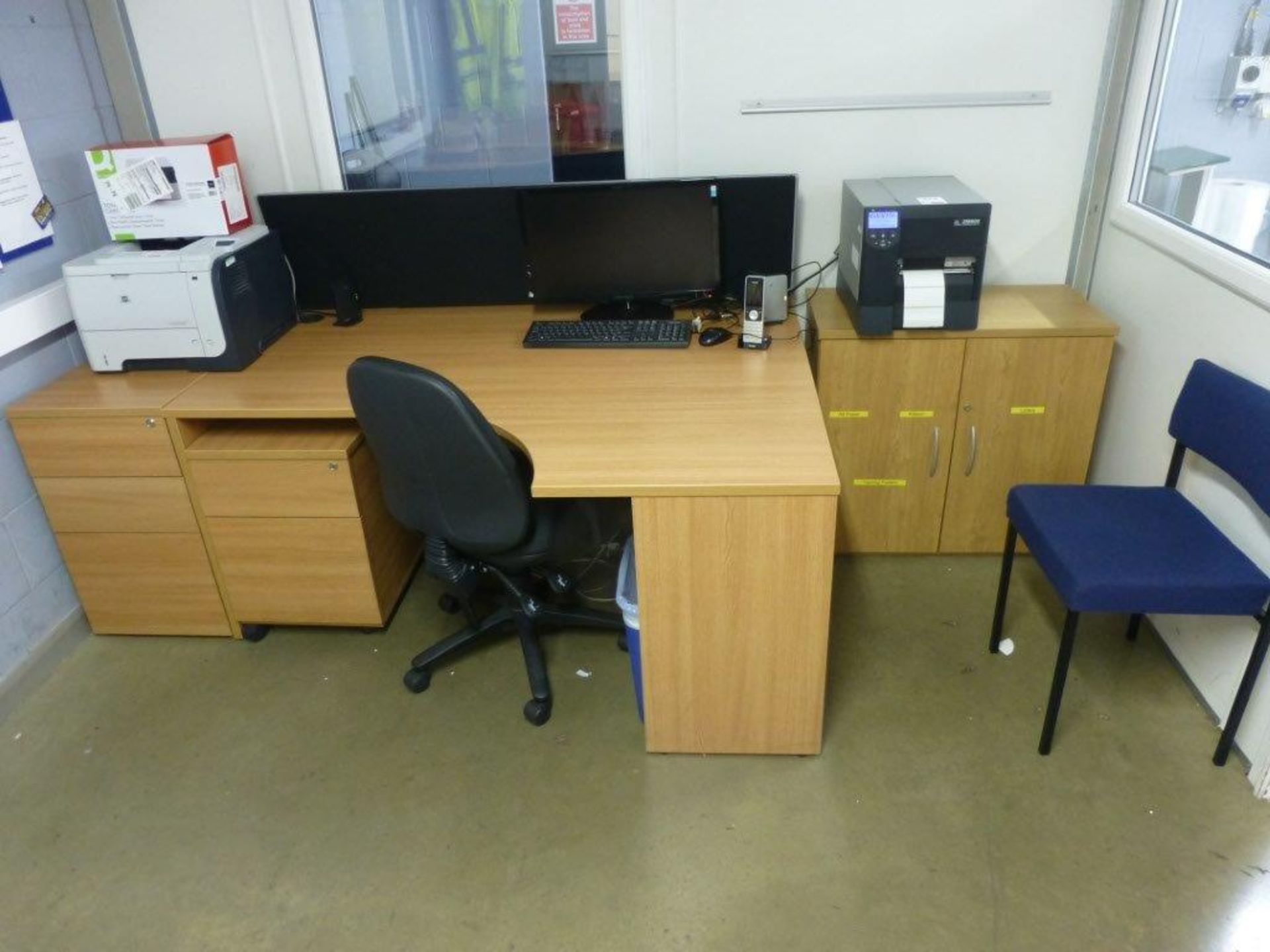 Furniture to Minder's office to include light wood effect workstation, double door cupboard, 2 3-