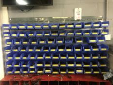 91 blue plastic storage bins with wall rack and contents mainly metric cap head screws and nuts