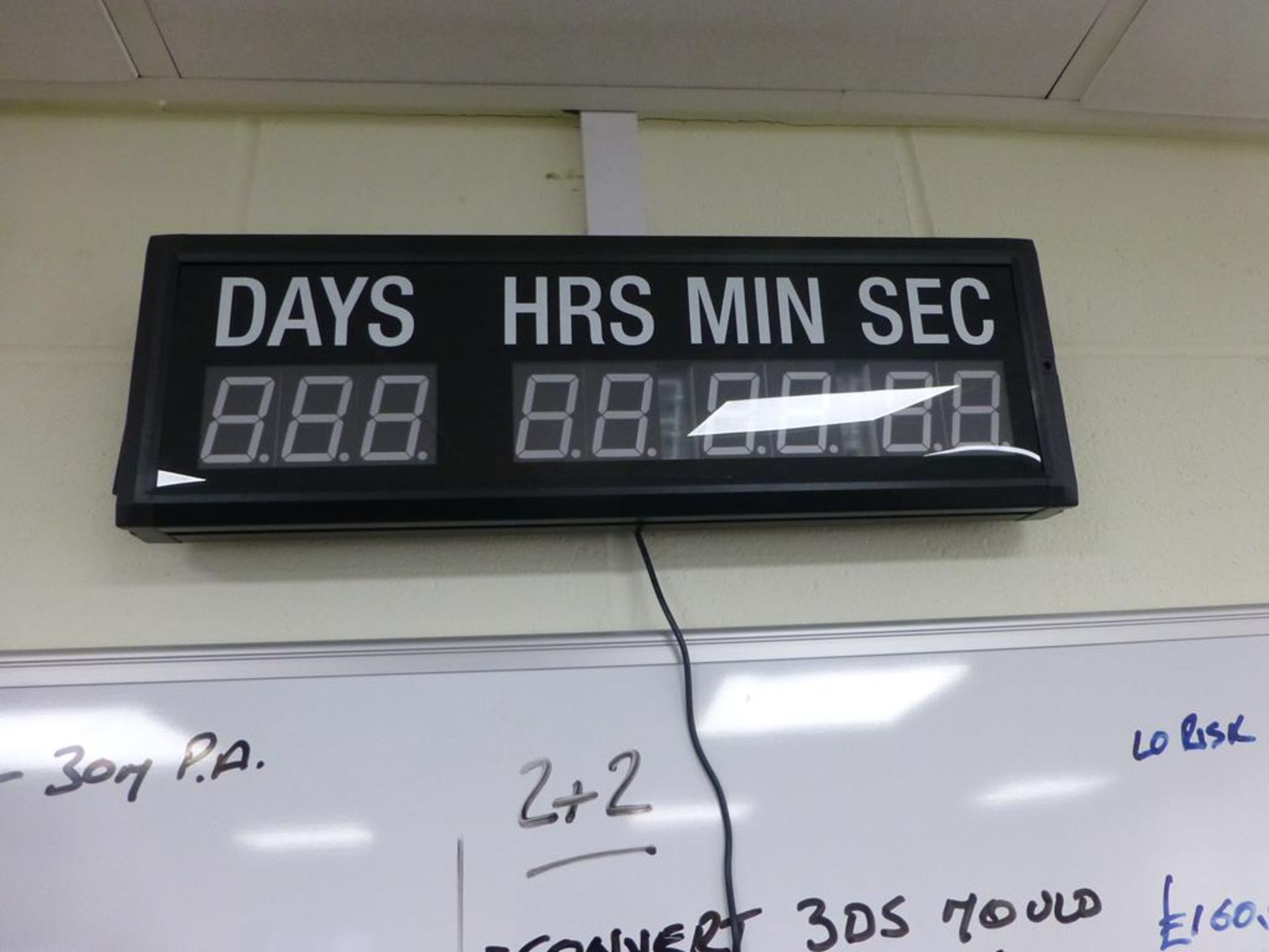 Wall mounted digital days/hours/minutes countdown display with remote programmer