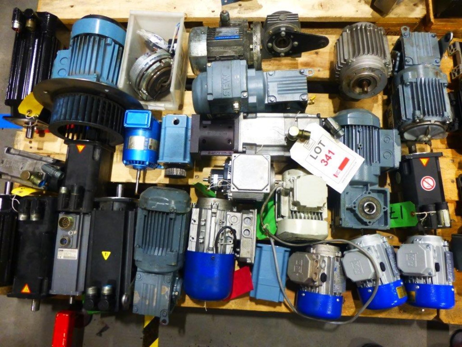 18 assorted spare electric motors and gearboxes on one pallet