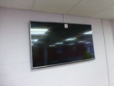 LG 55 inch LCD television with wall bracket