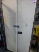 1.8m high steel double door cupboard with contents, mainly safety equipment