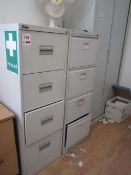 Two metal 4-drawer filing cabinets