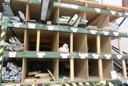 Contents of racking as marked including various size and colour of cills, trim and wood cills (