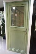 Green timber effect single glass pane UPVC door, approx 855 x 2080mm, with keys (Please note: