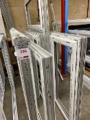 Seven White window frames only (No Glass) plus a fitting pack - sizes in mm 1885x1250, 2050x1215,