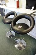 Two chrome effect/black leather effect stools (please note: this lot is located at the Salisbury