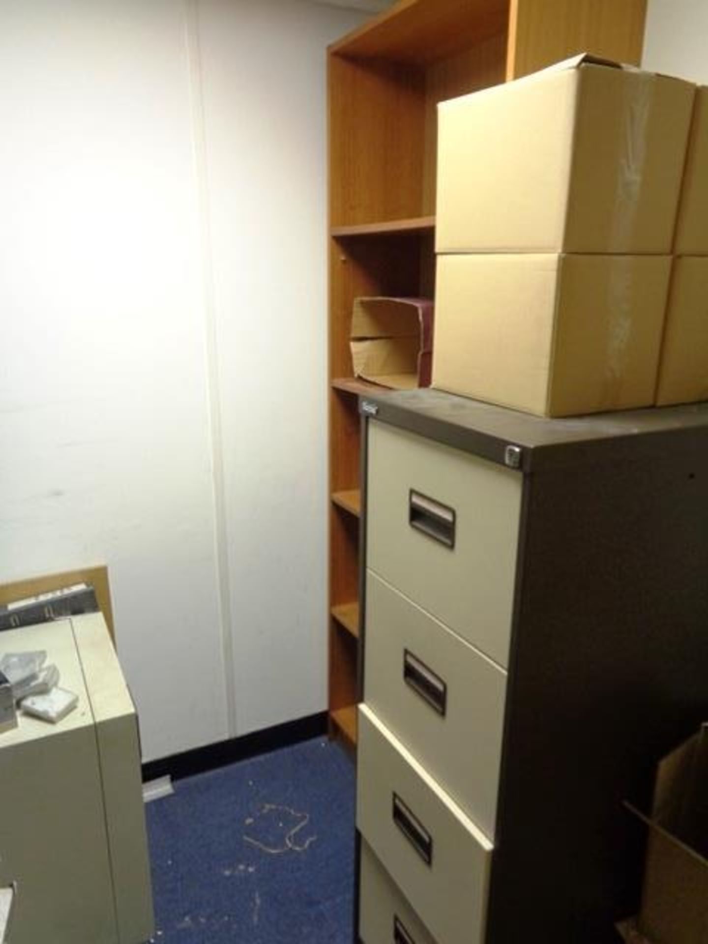 Contents of store room to include Royale 4-drawer filing cabinet, 5-shelf bookcase, Chubb key