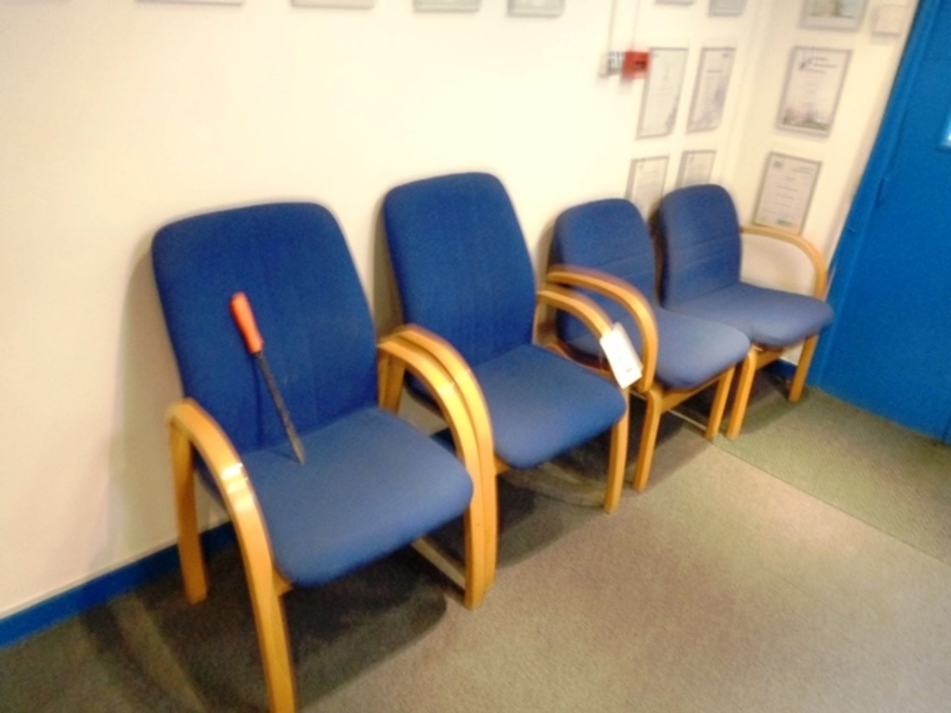 Four blue cloth upholstered reception chairs