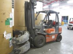 Nissan 30 LPG ride on forklift truck, model UGD02A30PQ with paper roll clamp attachment, max lift