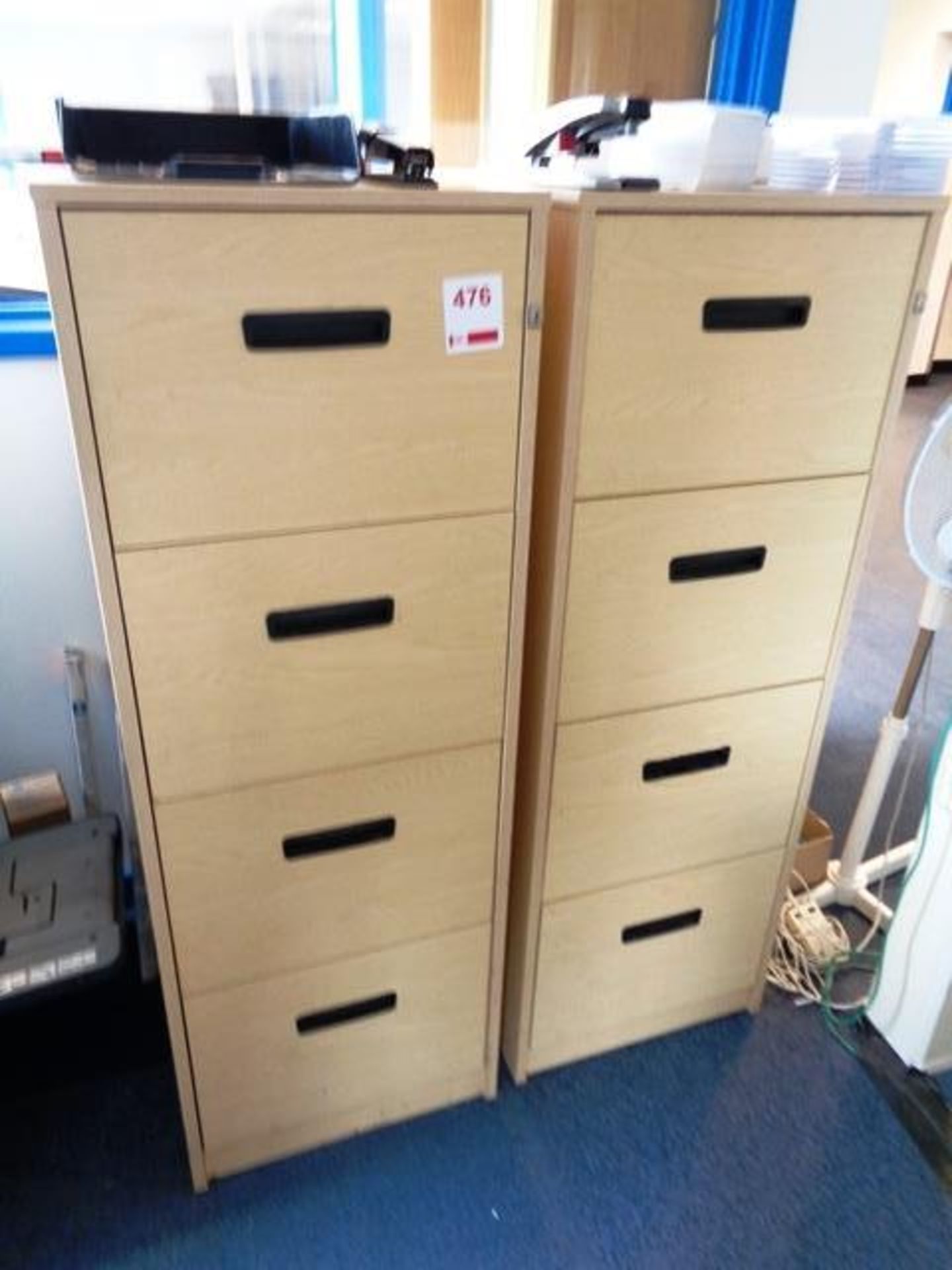 Two light wood 4-drawer filing cabinets