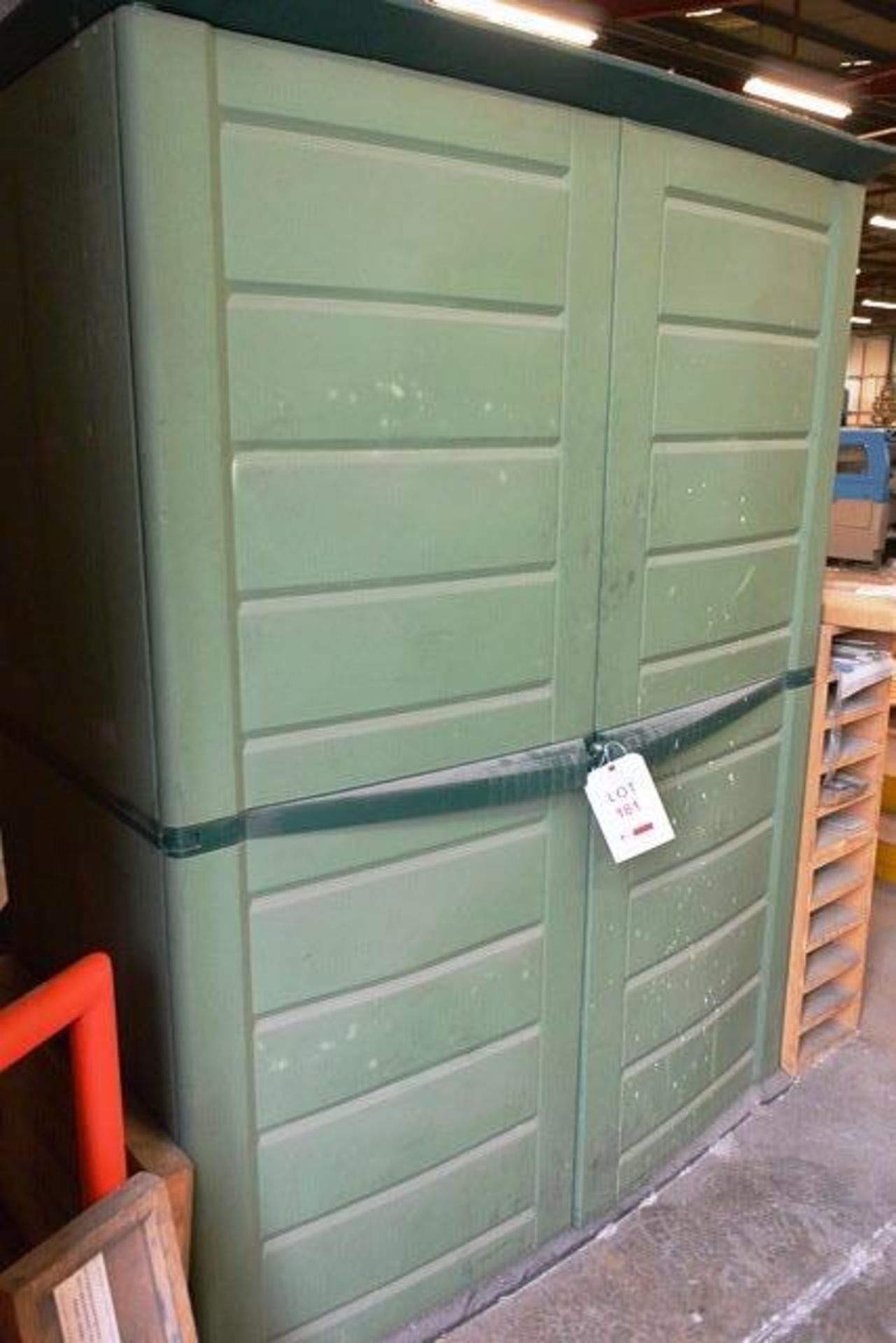Green plastic twin door storage unit, approx 2000mm in height (please note: excludes all contents)