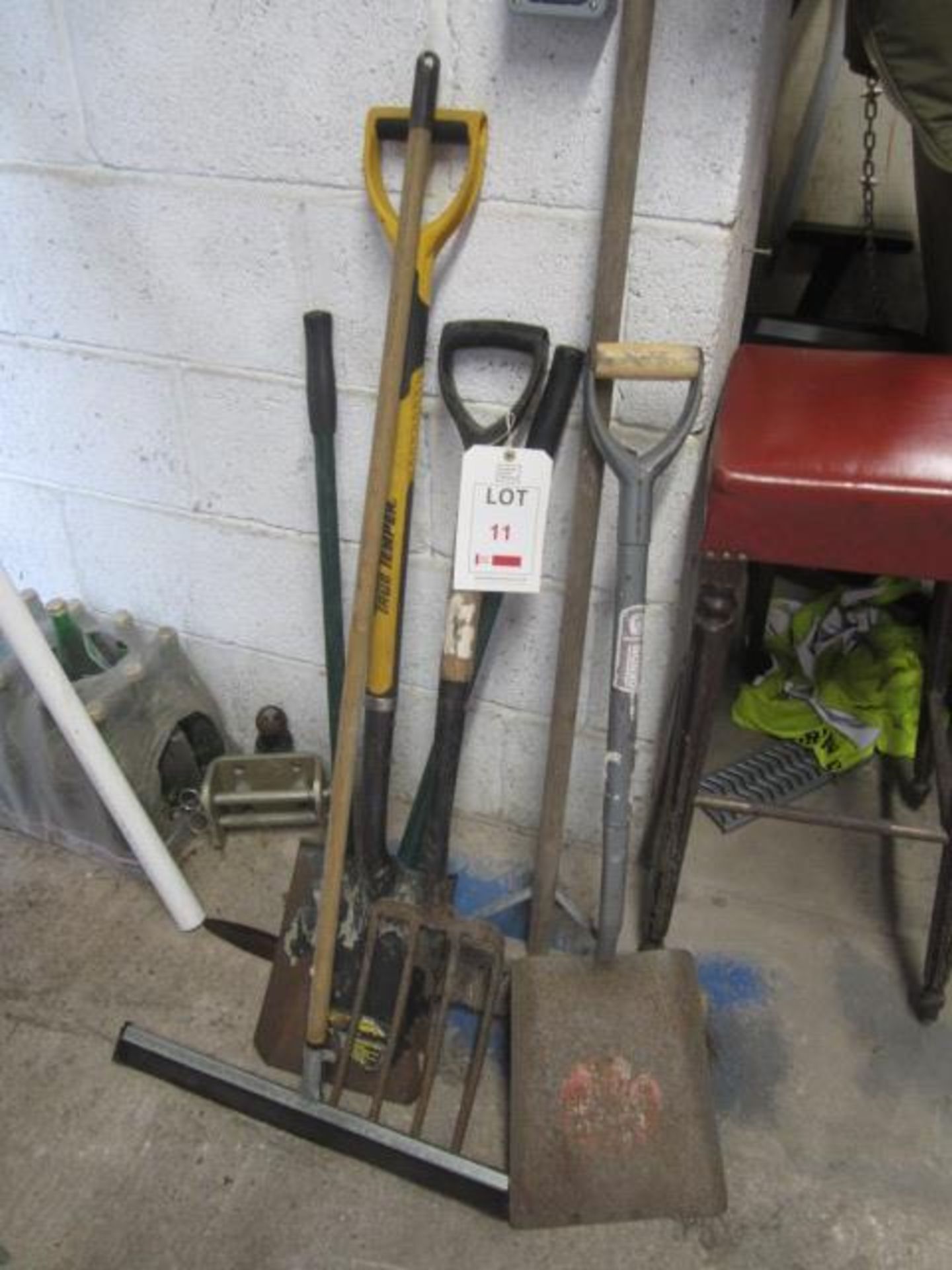 Assorted tools including fork, spades, squeegee, brush, edge grass shears etc.