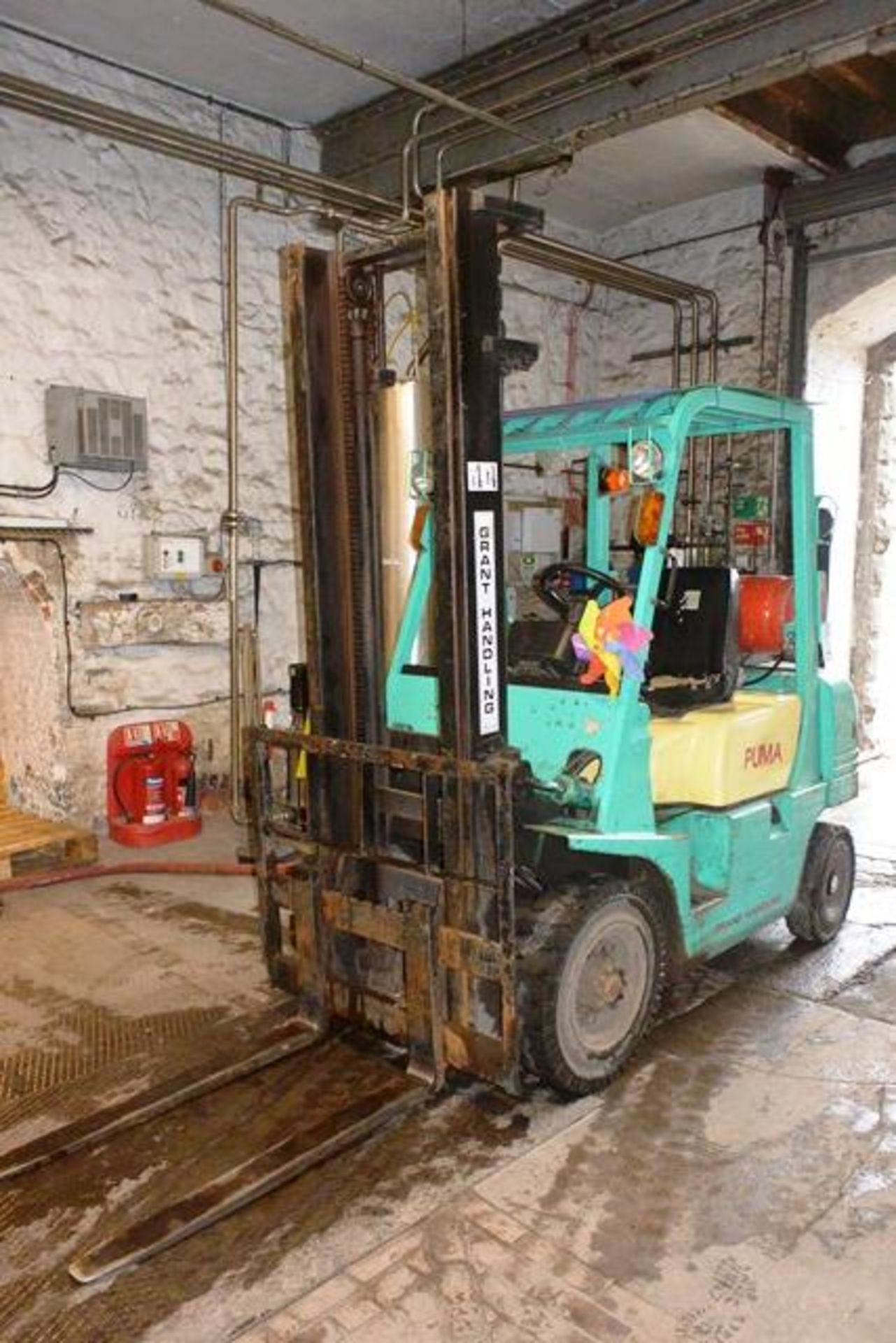 Yang Puma, LPG powered, duplex mast forklift, capacity, hours, serial no. and lift height unknown.