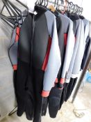 Large quantity of adult sized wet suits