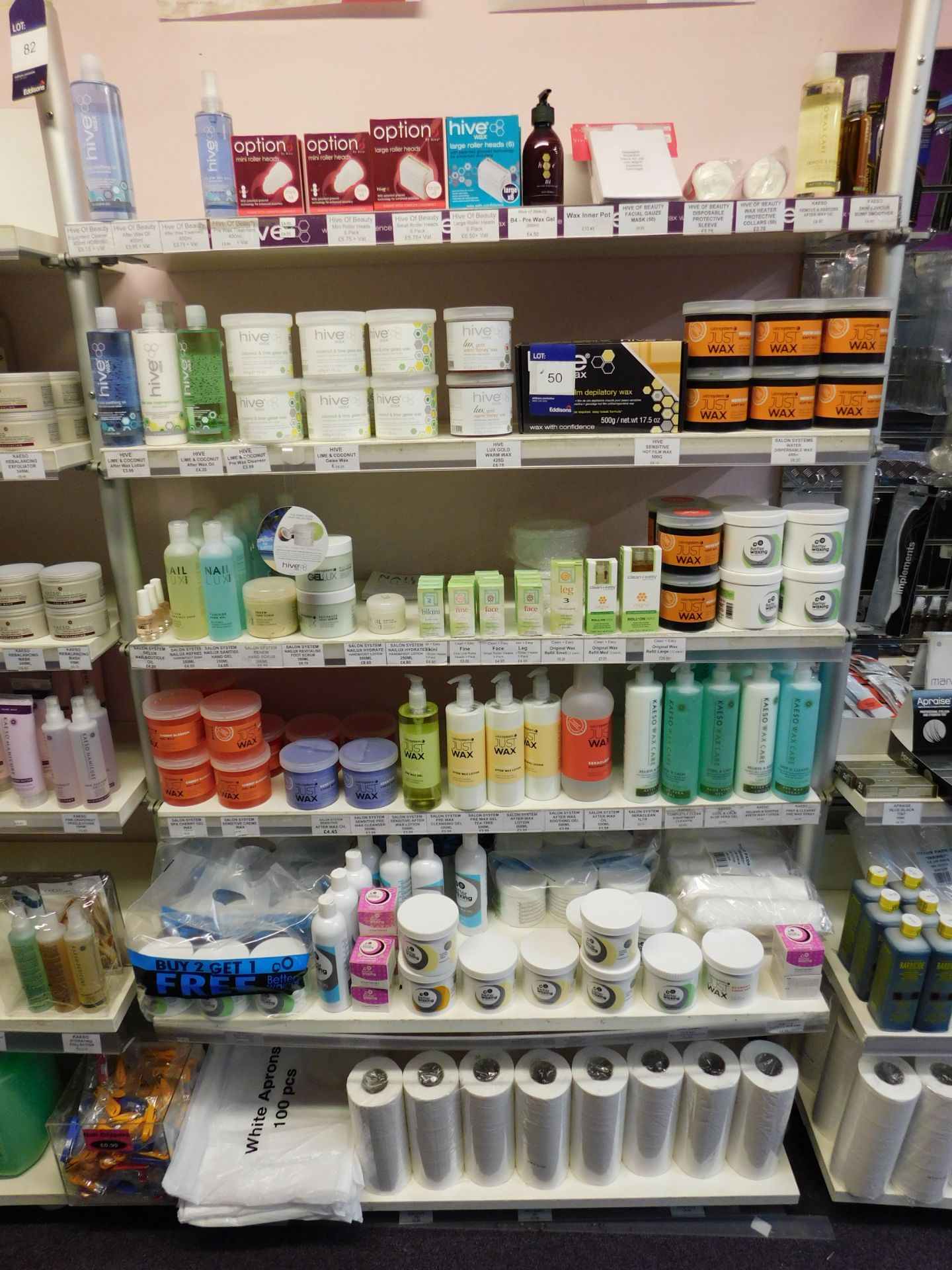 Assortment of waxing products to shelving