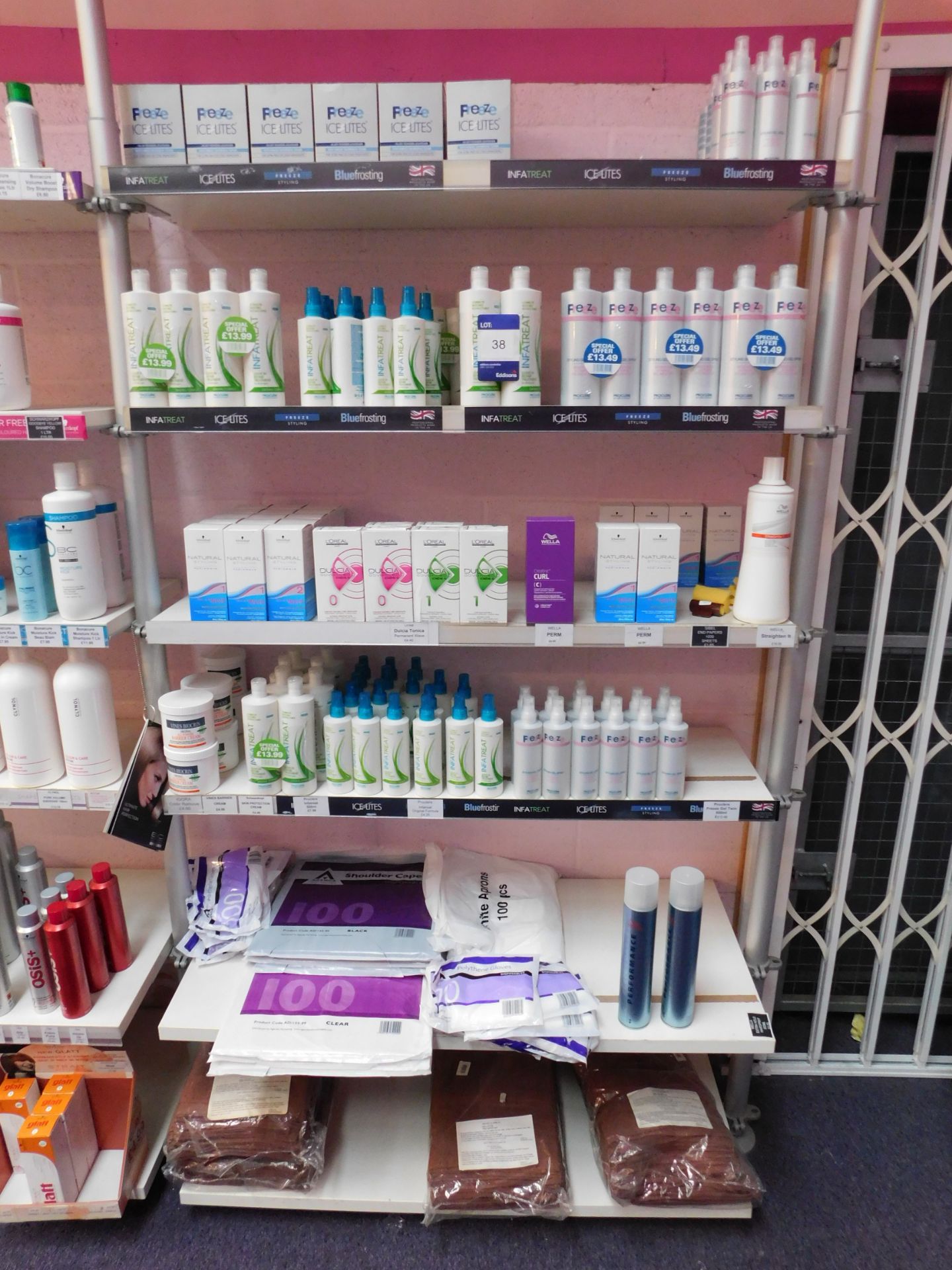 Contents to 1 bay of shop display shelving, to include assortment of styling sprays