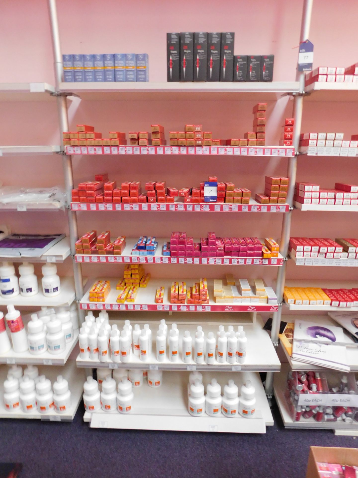 Contents to 1 bay of shop display shelving, to include an assortment of hair colour products