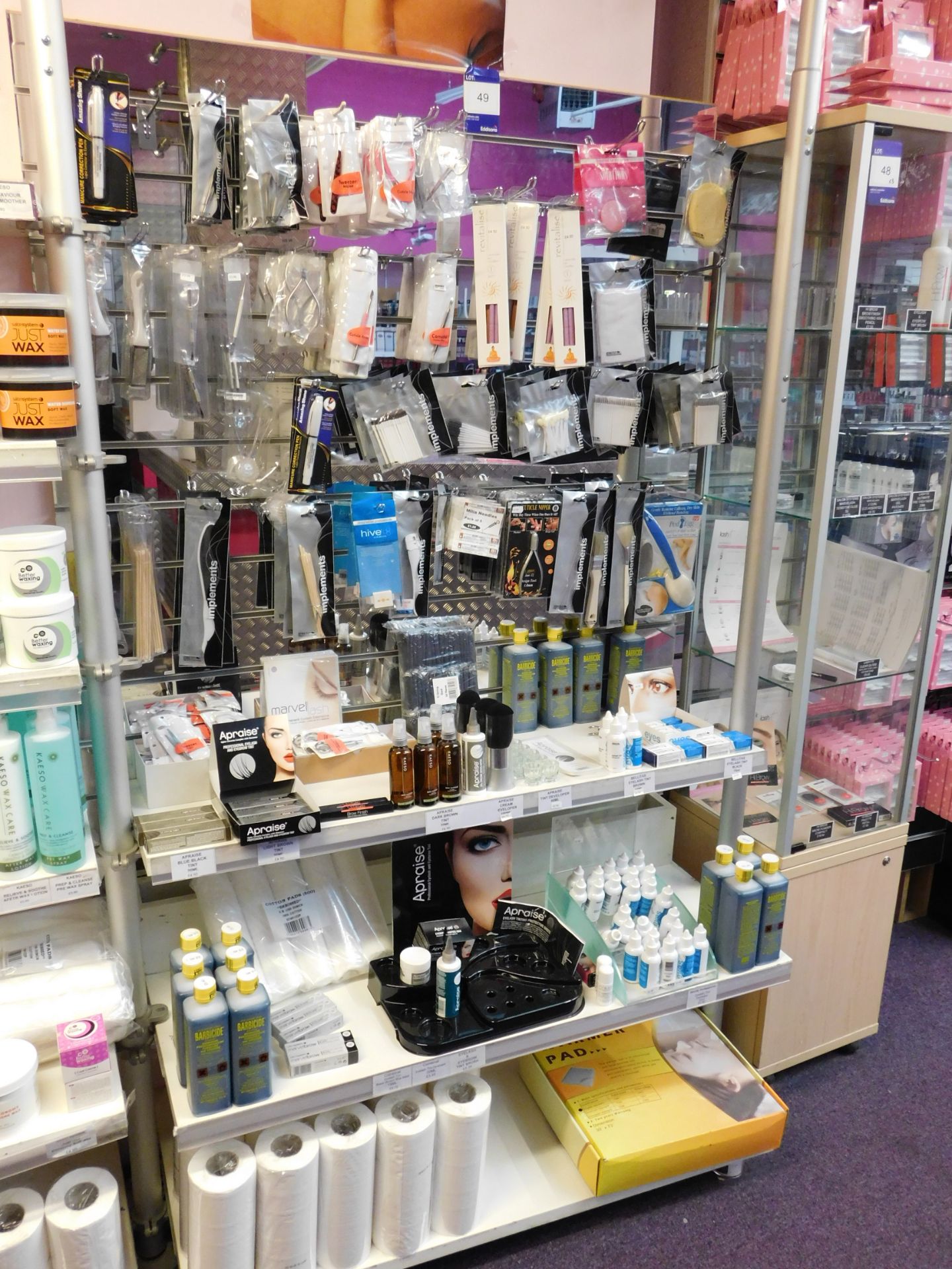 Assortment of beauty products, to display, including tweezers, manicure correction pens, eyelash