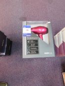 2 x BaByliss Pro pink powerlite hairdryers, and 2 x BaByliss Pro black powerlite hairdryers