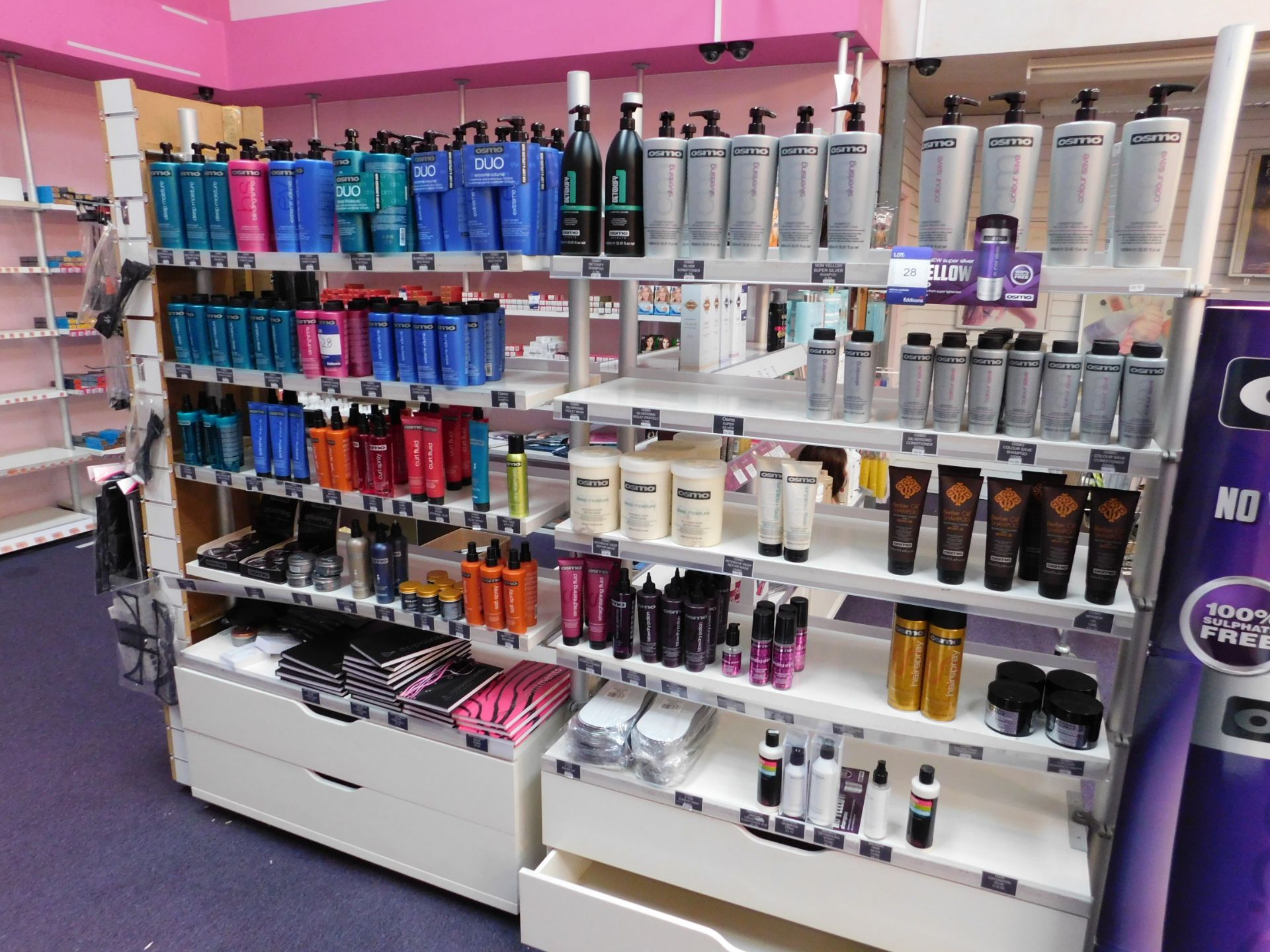 2 x Bays of shop display shelving and contents, including assortment of Osmo shampoos and