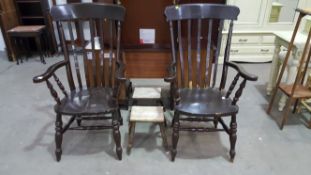 A Pair of Painted Windsor Armchairs together with