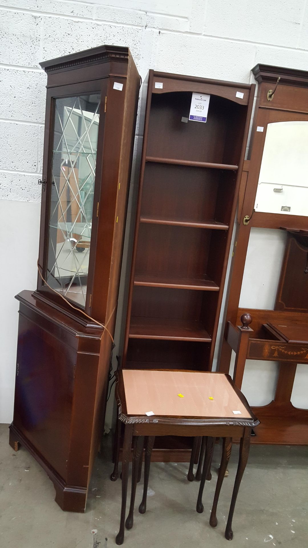 A Corner Cabinet, a Six Shelf Storage/Bookcase Uni