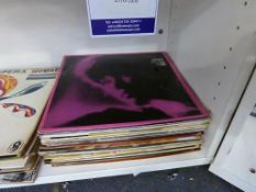 31 X assorted Vinyl Records.
