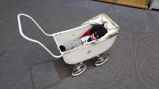 A Triang Pram together with Golly Doll