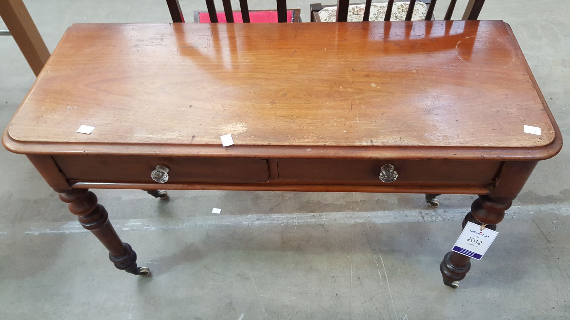 An Early Two Drawer Hall Table with Two Dining Cha