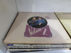 21 X assorted Vinyl Records.