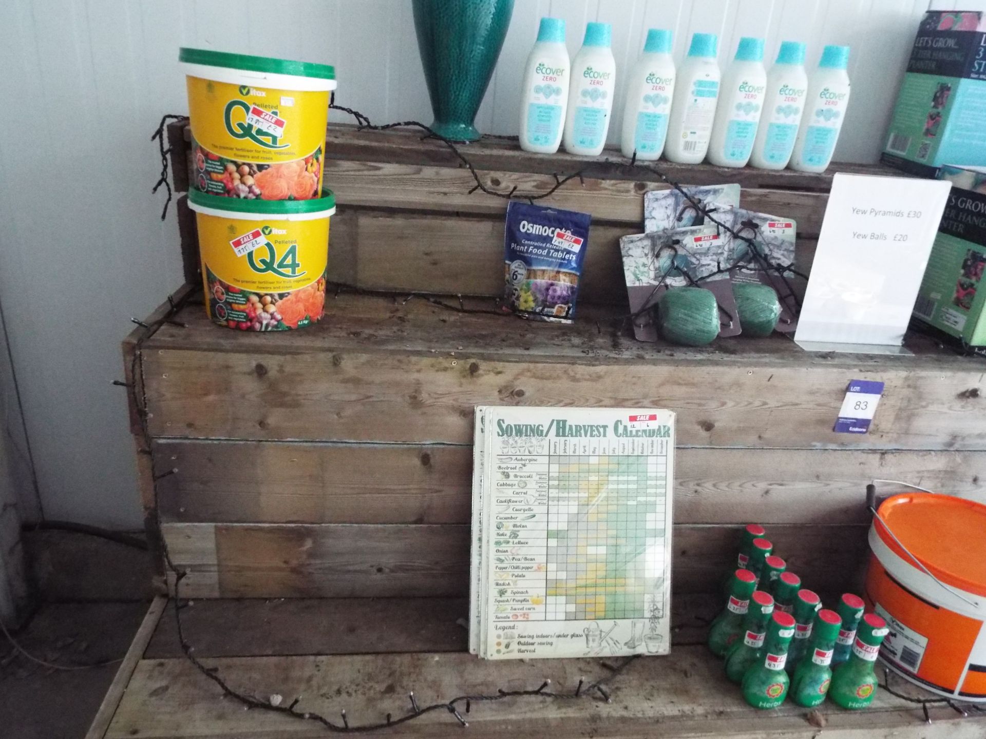 Contents of 3 Tier Wood Staging Display Unit to Include Fertilizers, Seeds and Planters etc. –