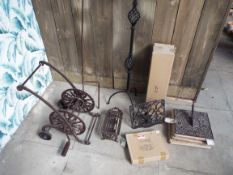 Various “Olde Worlde” Wrought and Cast Iron Items Including Candle Stick Holders, Sundials and